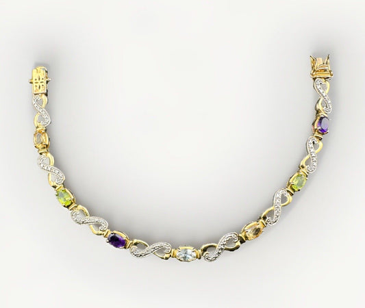 Pulsera de plata fina 925 chapada en oro con gemas multicolores, diseño infinito de corazón y "XO", 7.5 pulgadas, 10.4 g